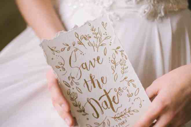 bride holding invitation